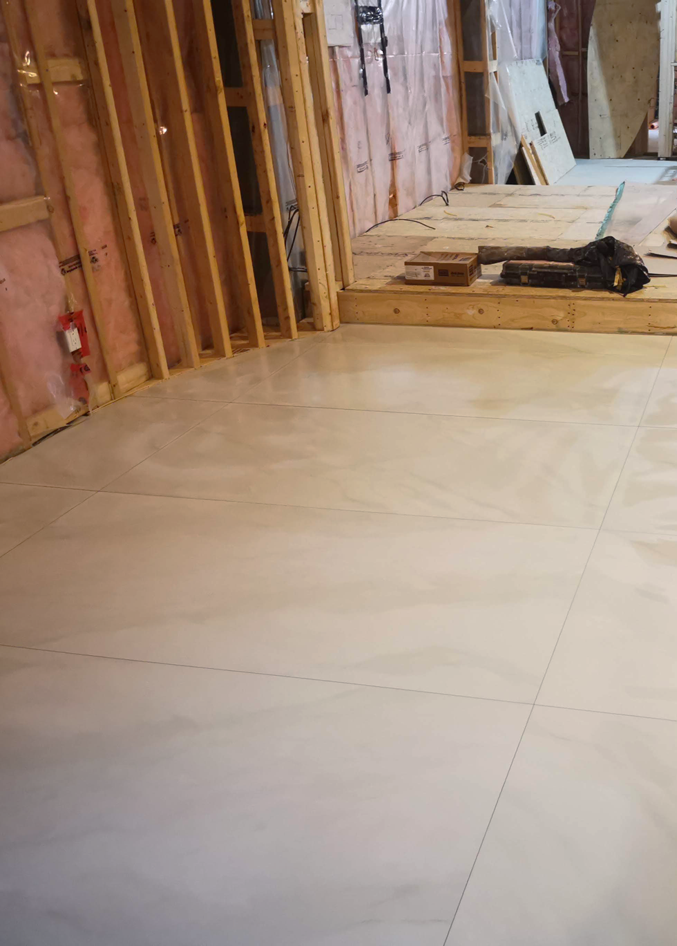 Large format tile floor installation — St. Catharines