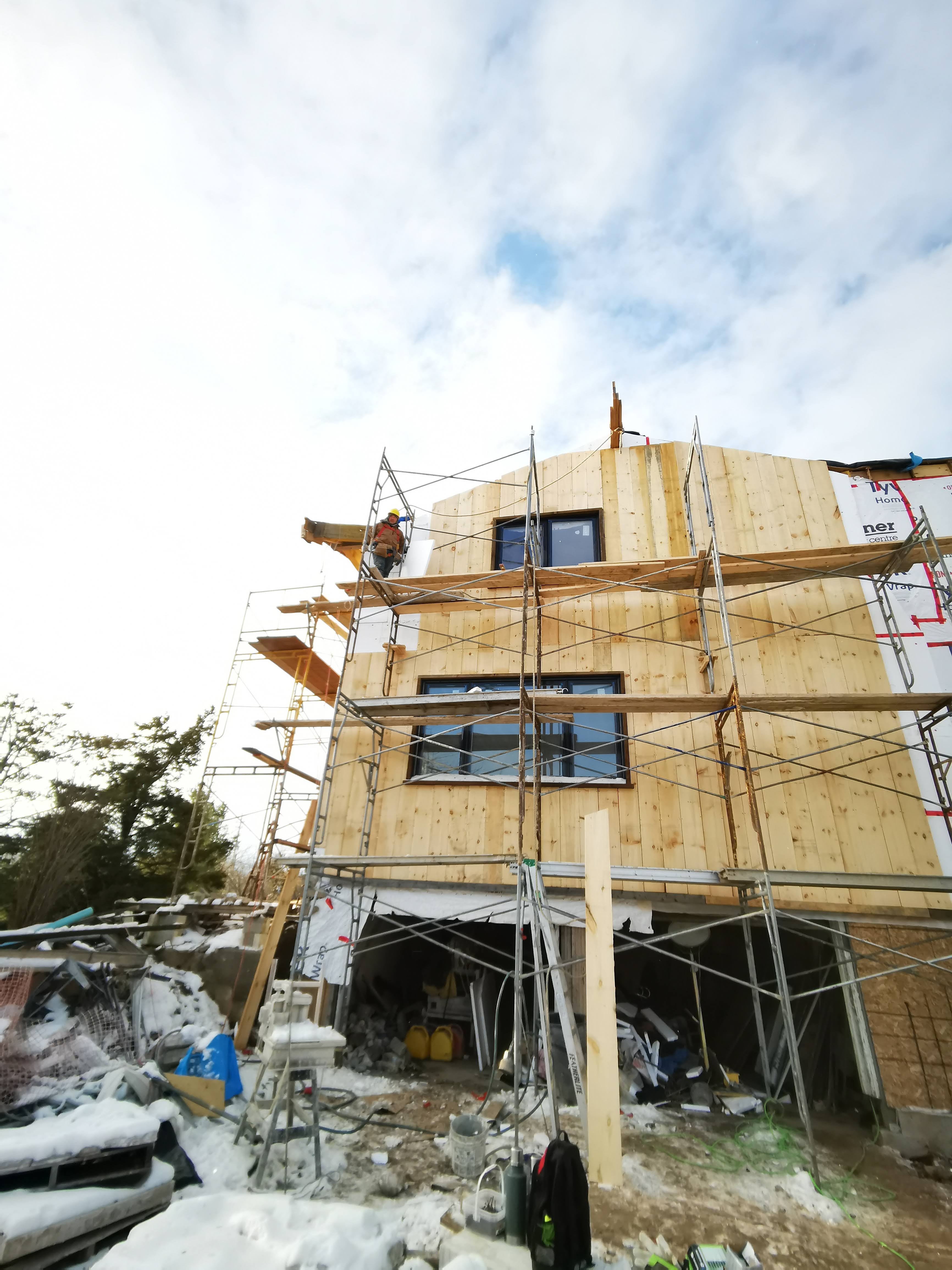 Wood siding installation on home exterior — Niagara Region
